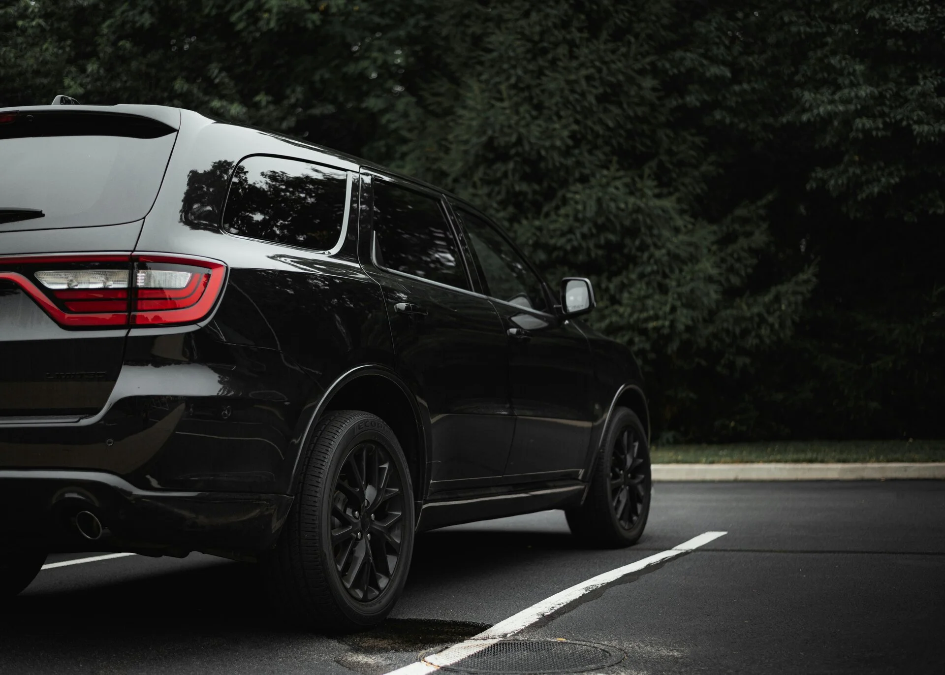 Black luxury SUV on the road